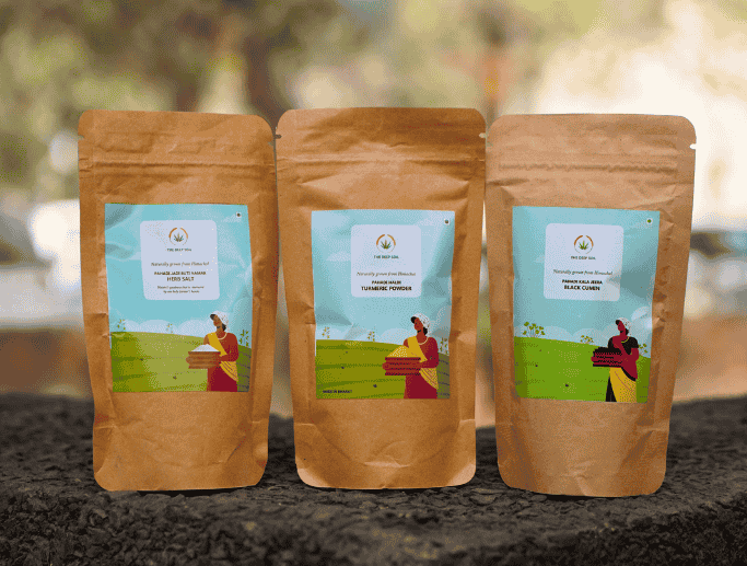 The Deep Soil Himalayan collection featuring Pahadi Jadi Buti Namak Herb Salt, Pahadi Haldi Turmeric Powder, and Pahadi Kala Jeera Black Cumin in brown paper pouches
