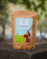 The Deep Soil Hemp Seed Flour brown paper package on a stone surface with nature background