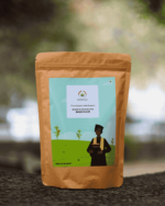 The Deep Soil Gharat Ka Makki Ka Atta Maize Flour brown paper package on a stone surface with nature background